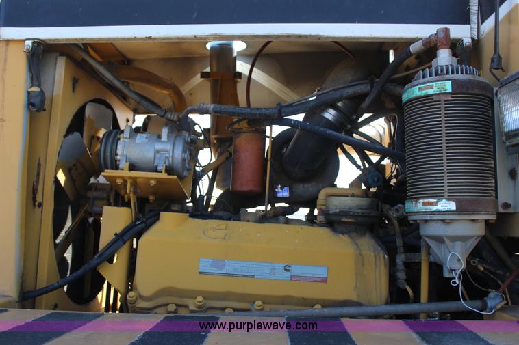 image for item J7559 Ag-Chem TerraGator 1664 self-propelled dry spreader applicator