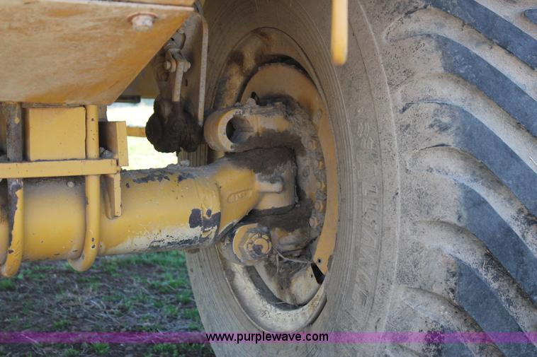 image for item J7559 Ag-Chem TerraGator 1664 self-propelled dry spreader applicator