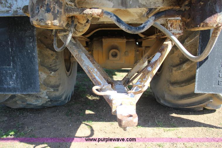 image for item J7559 Ag-Chem TerraGator 1664 self-propelled dry spreader applicator