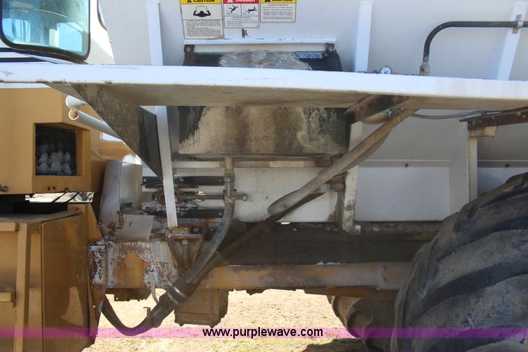 image for item J7559 Ag-Chem TerraGator 1664 self-propelled dry spreader applicator