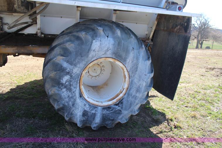 image for item J7559 Ag-Chem TerraGator 1664 self-propelled dry spreader applicator