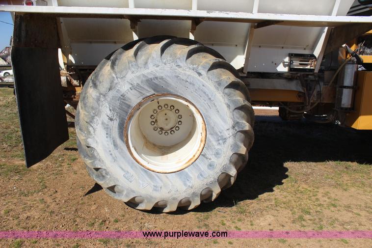 image for item J7559 Ag-Chem TerraGator 1664 self-propelled dry spreader applicator