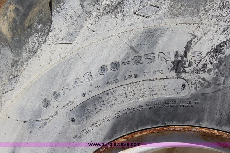 image for item J7559 Ag-Chem TerraGator 1664 self-propelled dry spreader applicator