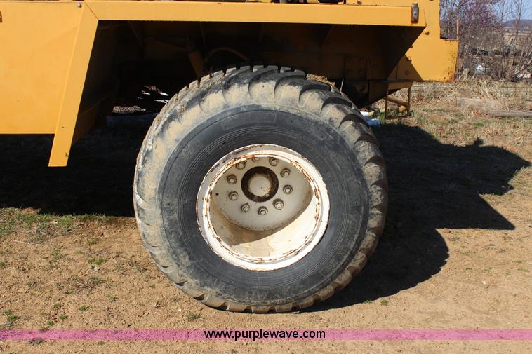 image for item J7559 Ag-Chem TerraGator 1664 self-propelled dry spreader applicator