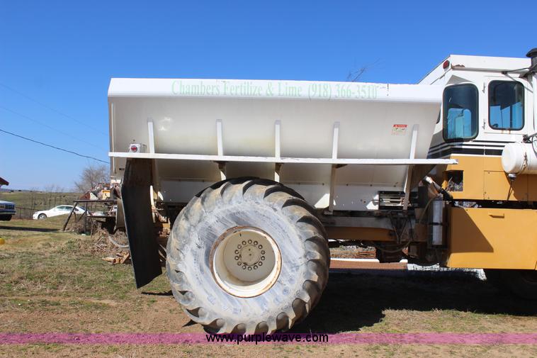 image for item J7559 Ag-Chem TerraGator 1664 self-propelled dry spreader applicator