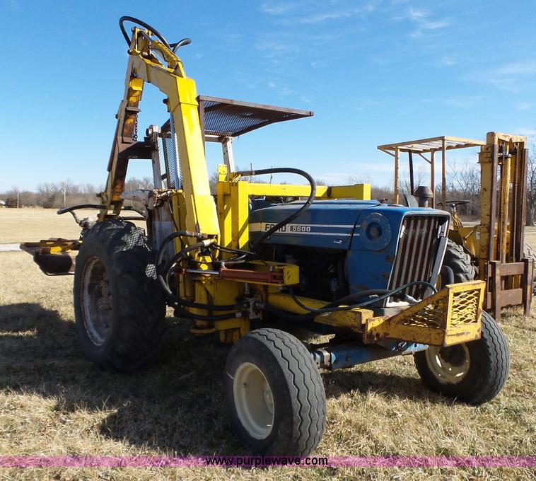 image for item L6250 Ford 5600 tractor with side boom mower