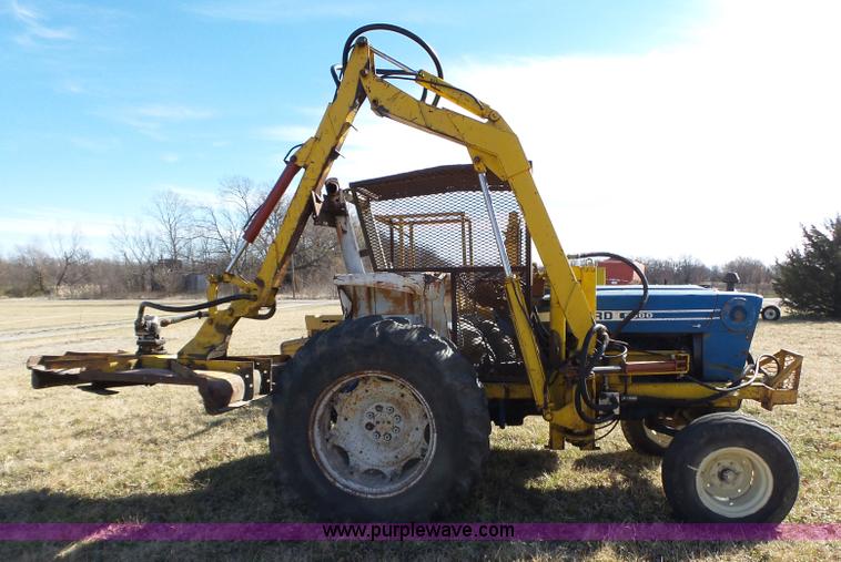 image for item L6250 Ford 5600 tractor with side boom mower