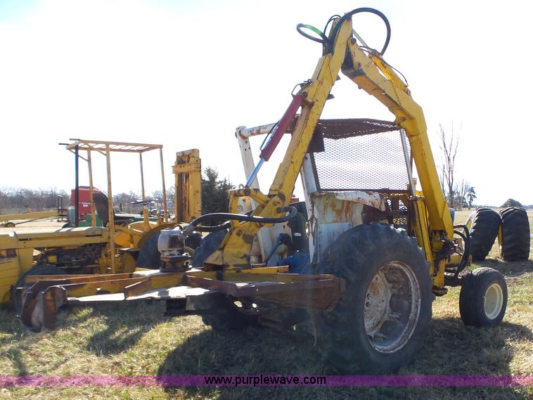 image for item L6250 Ford 5600 tractor with side boom mower