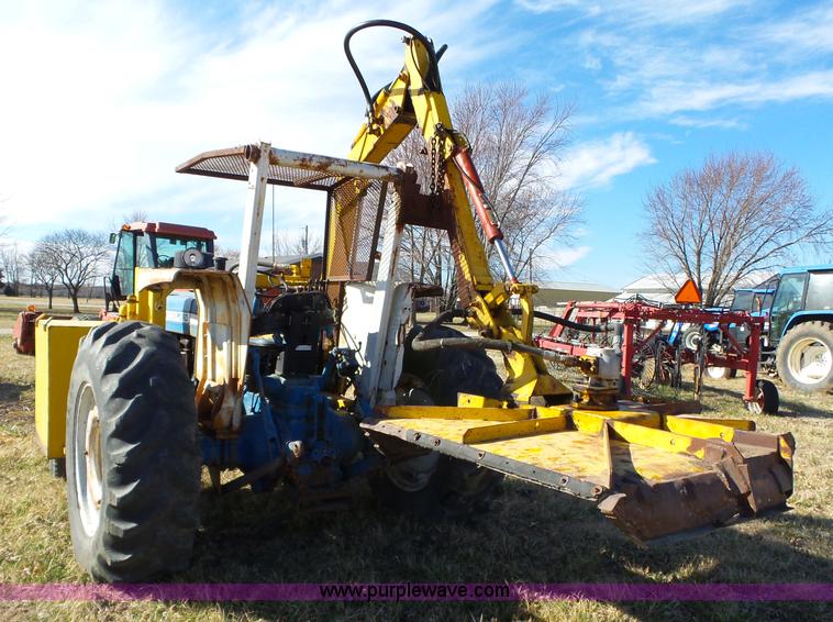 image for item L6250 Ford 5600 tractor with side boom mower