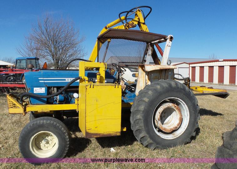 image for item L6250 Ford 5600 tractor with side boom mower