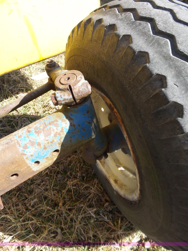 image for item L6250 Ford 5600 tractor with side boom mower
