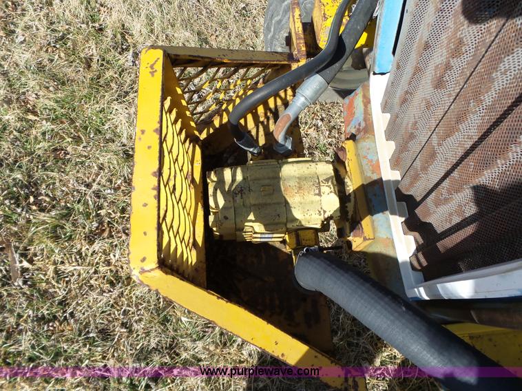 image for item L6250 Ford 5600 tractor with side boom mower