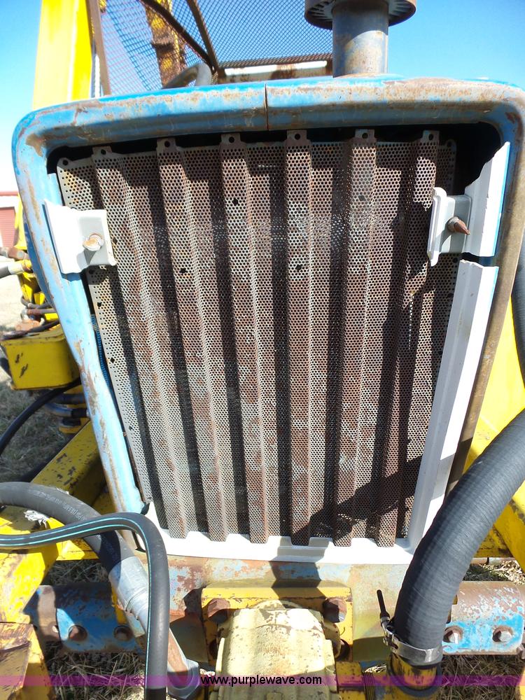 image for item L6250 Ford 5600 tractor with side boom mower