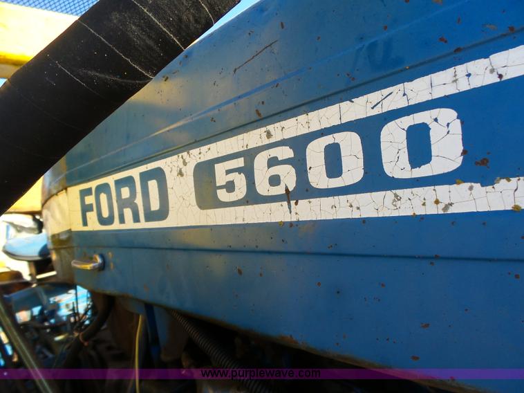 image for item L6250 Ford 5600 tractor with side boom mower