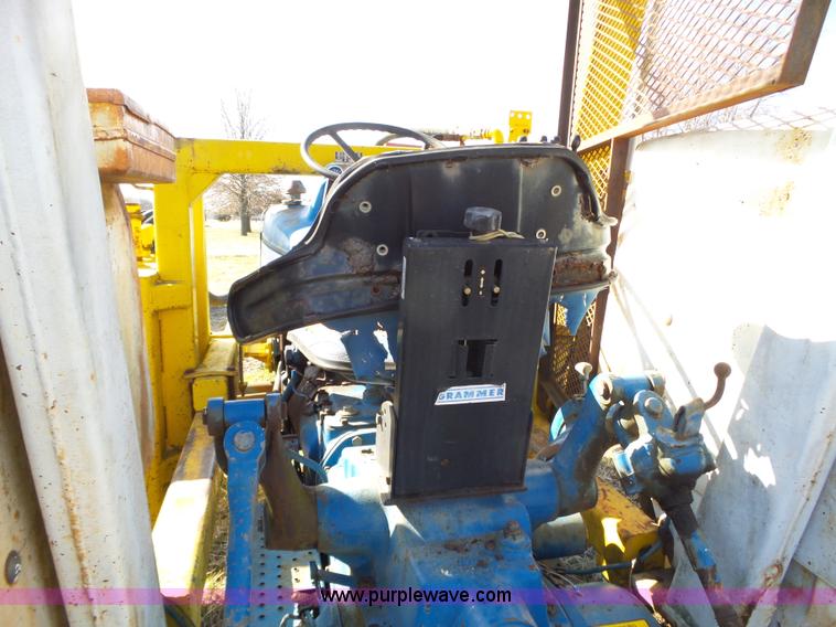 image for item L6250 Ford 5600 tractor with side boom mower
