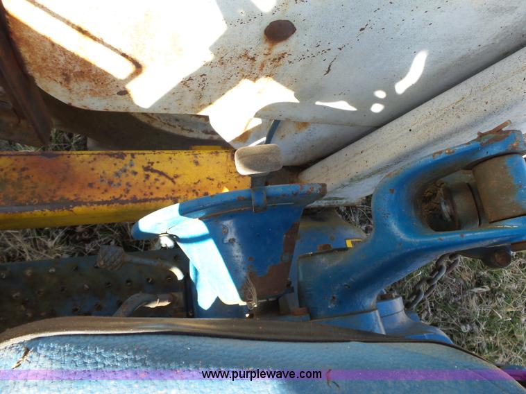 image for item L6250 Ford 5600 tractor with side boom mower
