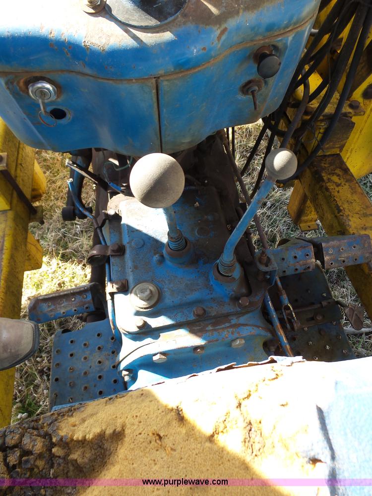 image for item L6250 Ford 5600 tractor with side boom mower
