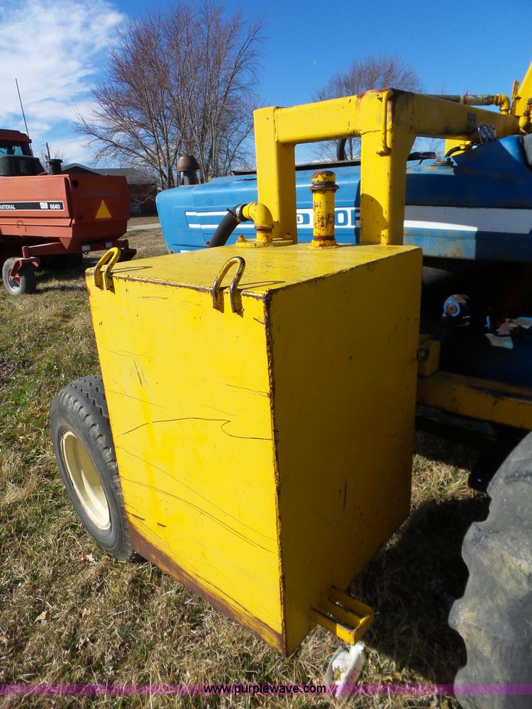 image for item L6250 Ford 5600 tractor with side boom mower