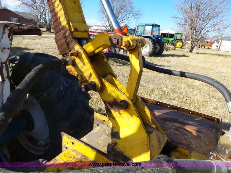 image for item L6250 Ford 5600 tractor with side boom mower