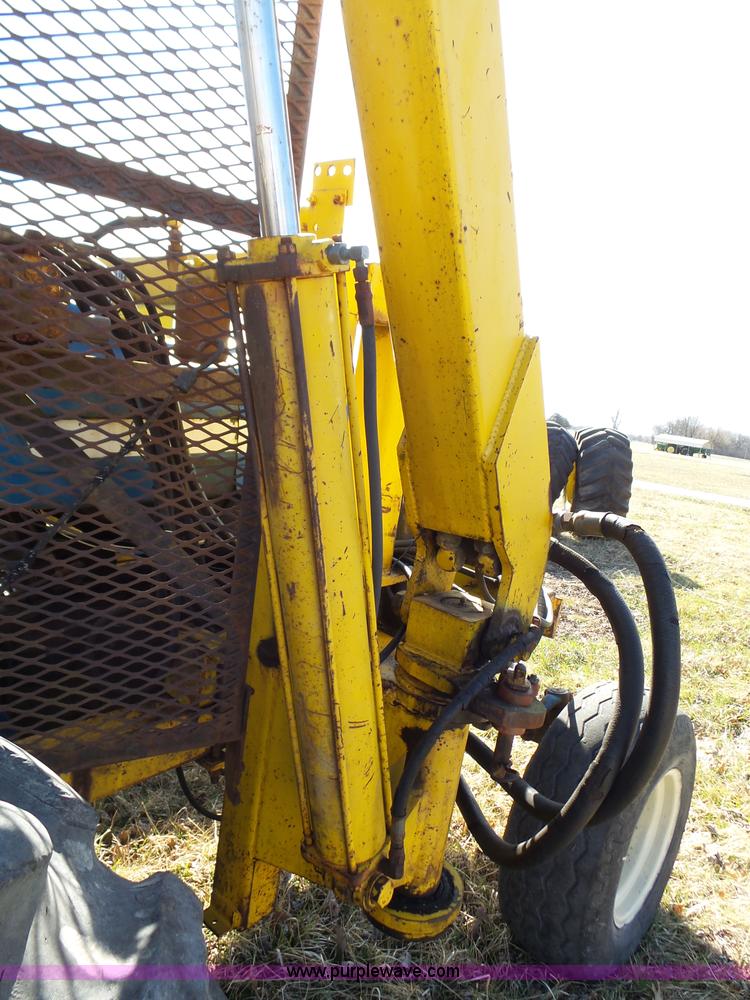 image for item L6250 Ford 5600 tractor with side boom mower