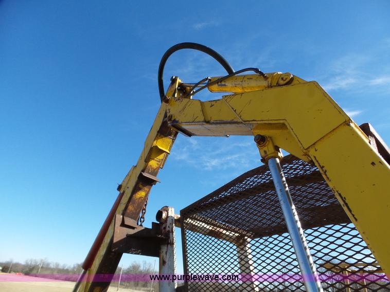 image for item L6250 Ford 5600 tractor with side boom mower