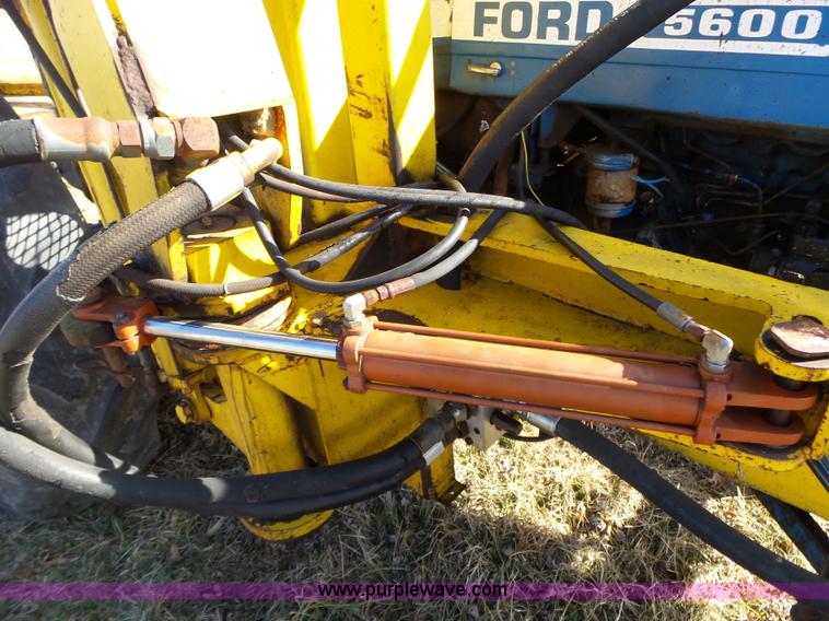 image for item L6250 Ford 5600 tractor with side boom mower