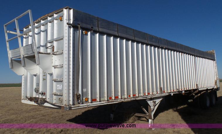 image for item L6499 2002 Imco T107 chain/slat bottom silage trailer