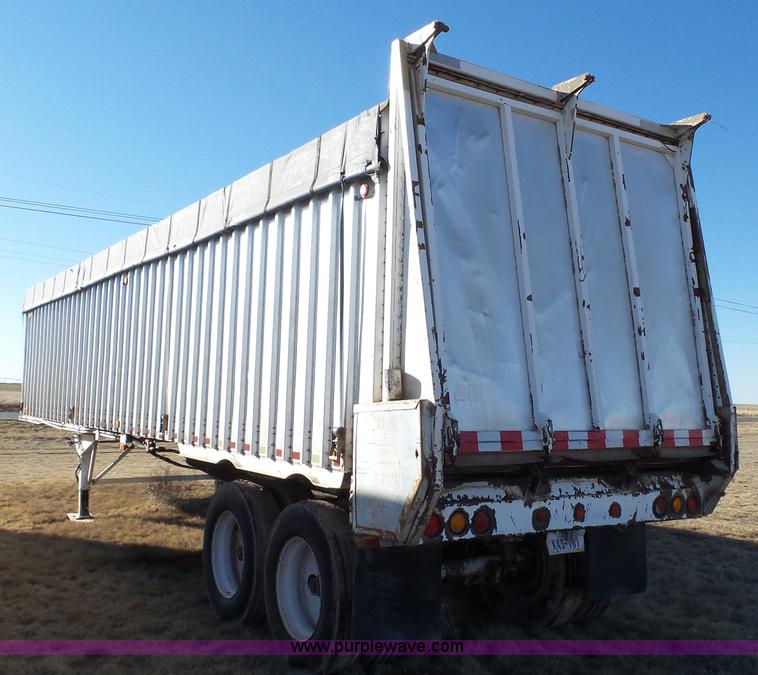 image for item L6499 2002 Imco T107 chain/slat bottom silage trailer