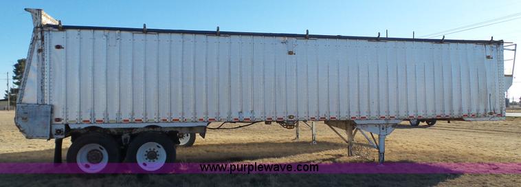 image for item L6499 2002 Imco T107 chain/slat bottom silage trailer