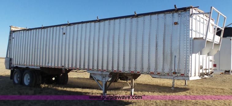 image for item L6499 2002 Imco T107 chain/slat bottom silage trailer