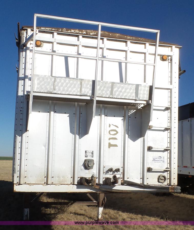 image for item L6499 2002 Imco T107 chain/slat bottom silage trailer