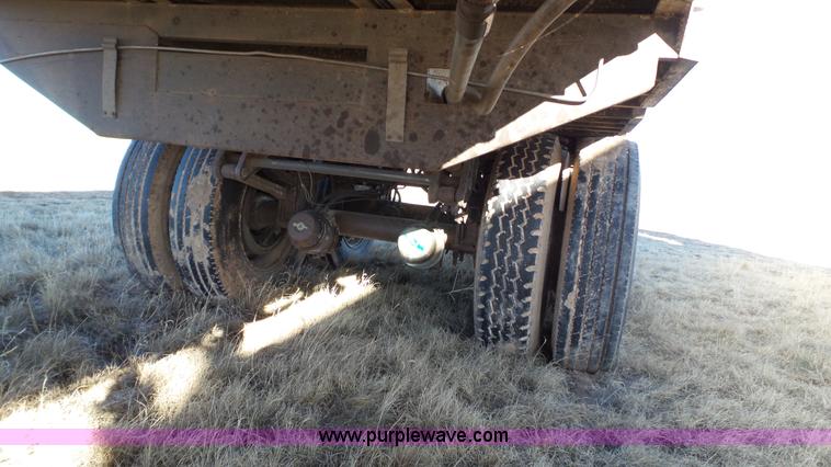 image for item L6499 2002 Imco T107 chain/slat bottom silage trailer