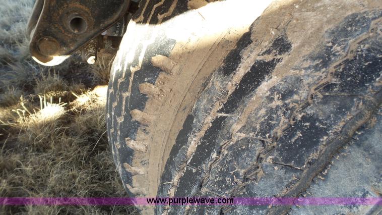 image for item L6499 2002 Imco T107 chain/slat bottom silage trailer