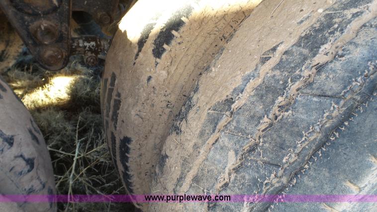 image for item L6499 2002 Imco T107 chain/slat bottom silage trailer