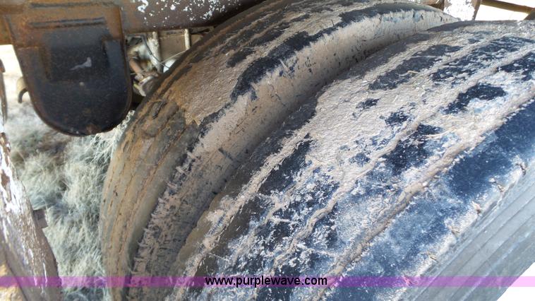 image for item L6499 2002 Imco T107 chain/slat bottom silage trailer