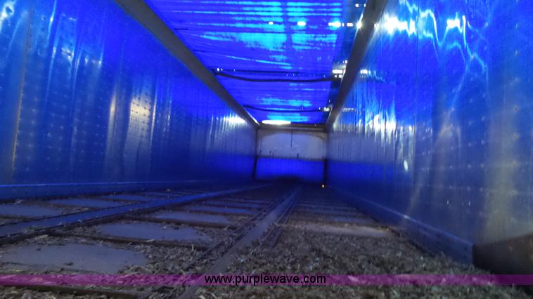 image for item L6499 2002 Imco T107 chain/slat bottom silage trailer