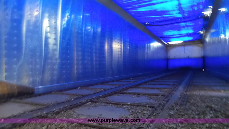 image for item L6499 2002 Imco T107 chain/slat bottom silage trailer