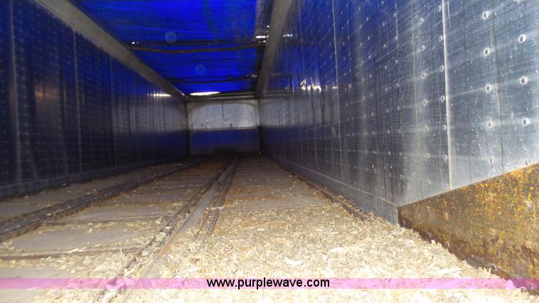 image for item L6499 2002 Imco T107 chain/slat bottom silage trailer