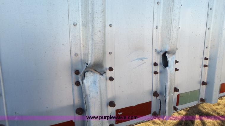 image for item L6499 2002 Imco T107 chain/slat bottom silage trailer