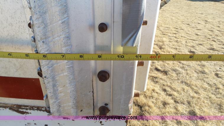 image for item L6499 2002 Imco T107 chain/slat bottom silage trailer