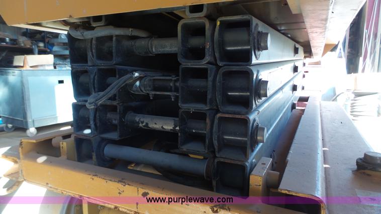 image for item AO9884 1999 Grove SM3248E scissor lift