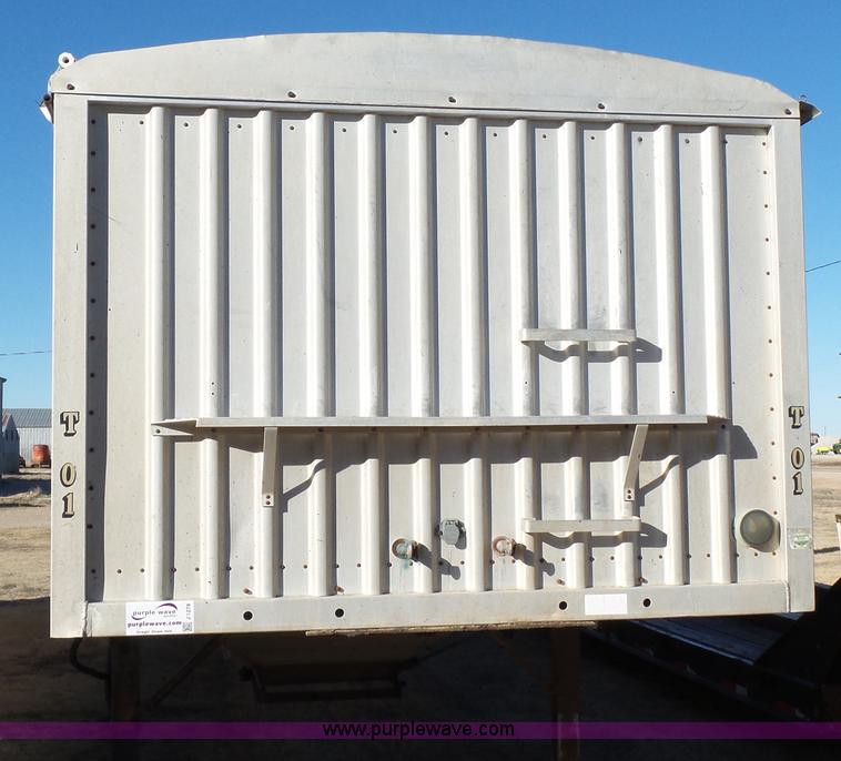 image for item J1278 1983 Chamberlin JAGH-700 double hopper grain trailer