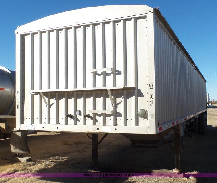 image for item J1278 1983 Chamberlin JAGH-700 double hopper grain trailer