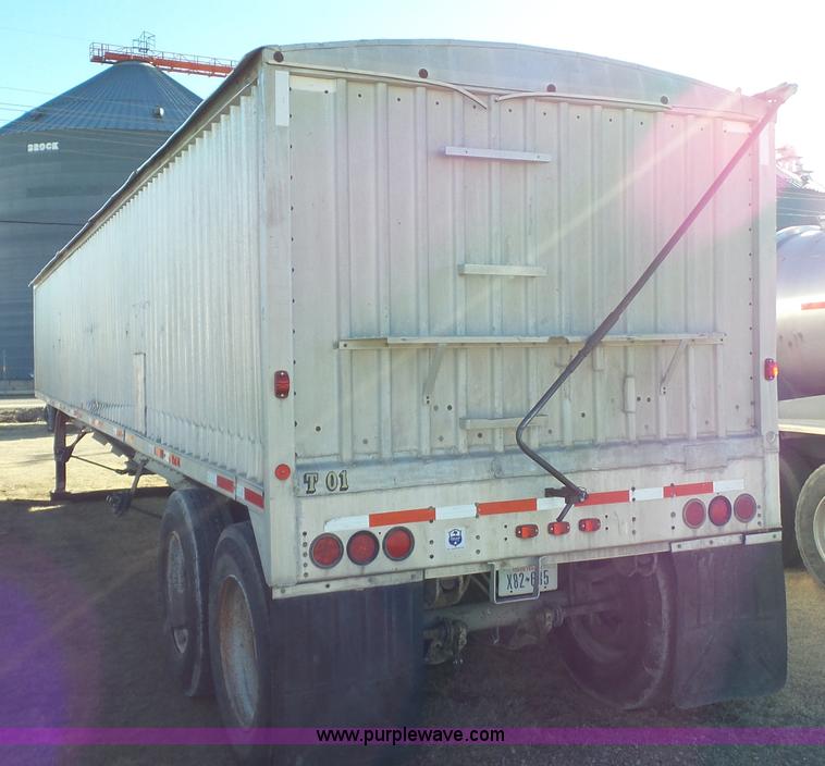 image for item J1278 1983 Chamberlin JAGH-700 double hopper grain trailer