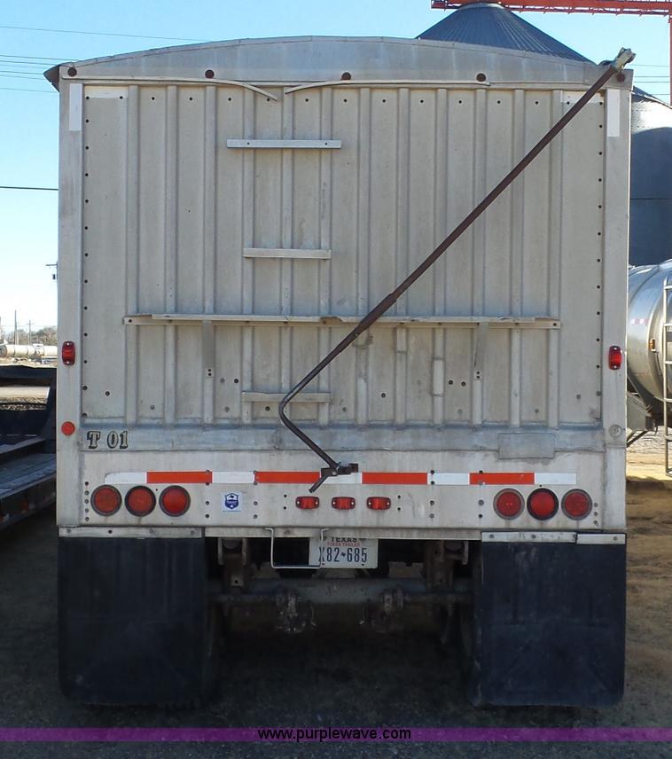 image for item J1278 1983 Chamberlin JAGH-700 double hopper grain trailer