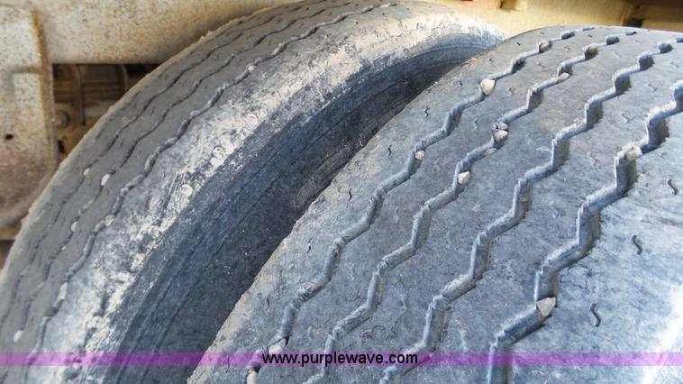 image for item J1278 1983 Chamberlin JAGH-700 double hopper grain trailer