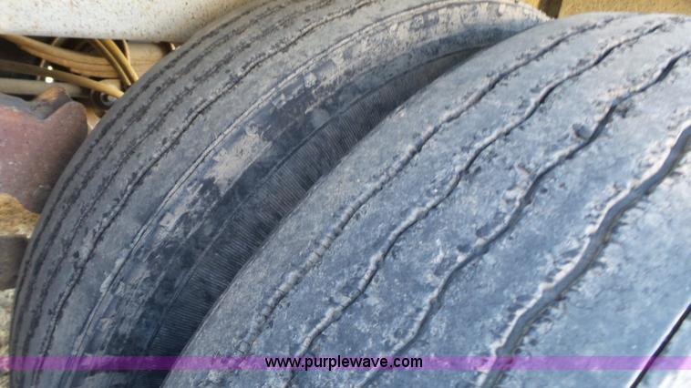 image for item J1278 1983 Chamberlin JAGH-700 double hopper grain trailer