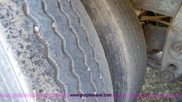 image for item J1278 1983 Chamberlin JAGH-700 double hopper grain trailer