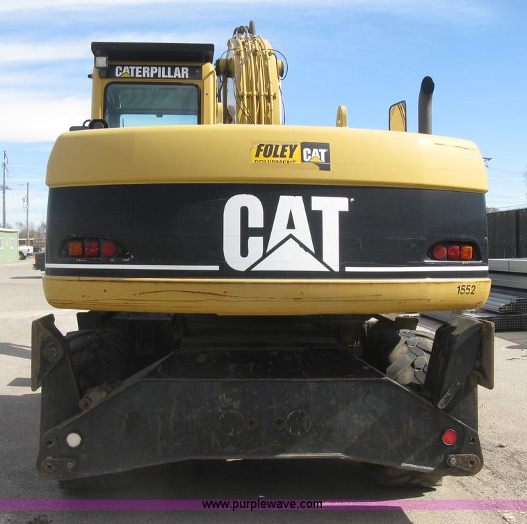 image for item J2903 Caterpillar M318C rubber tire excavator