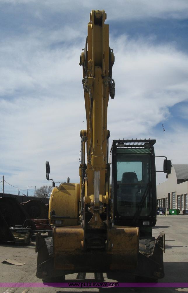 image for item J2903 Caterpillar M318C rubber tire excavator